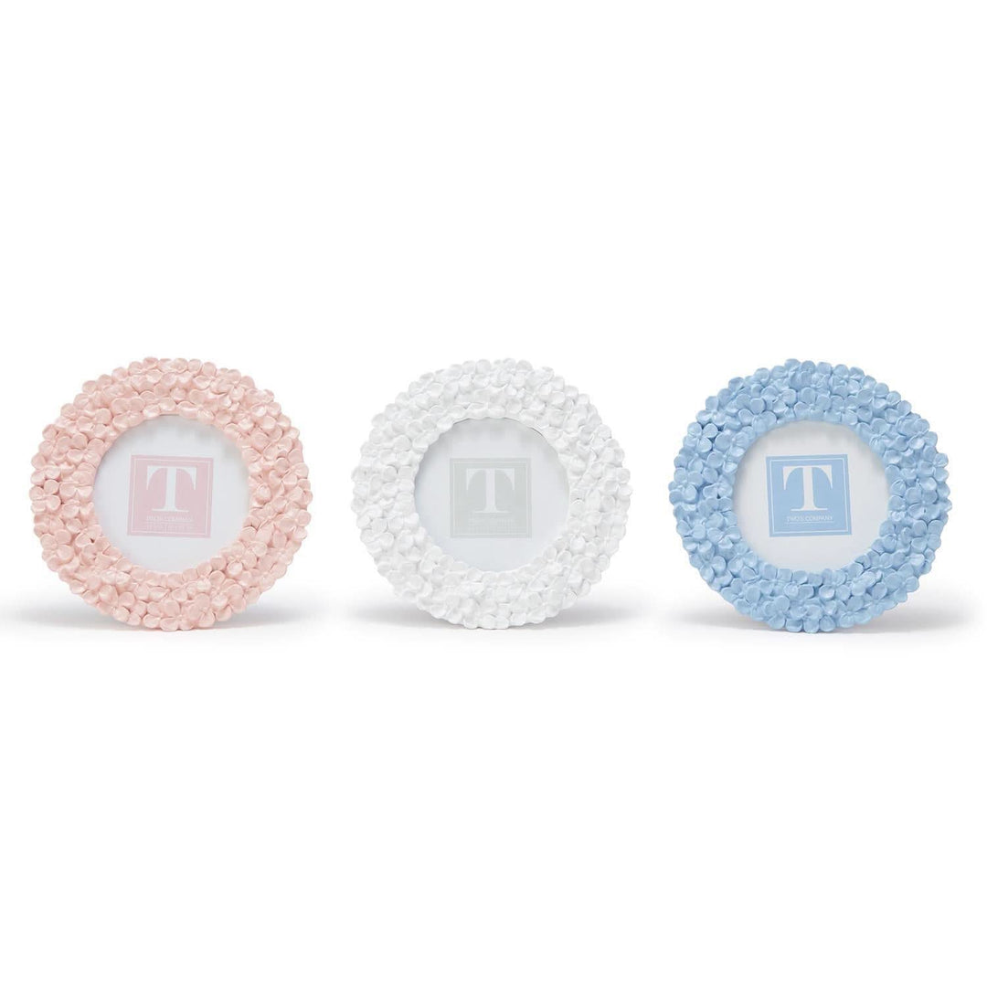 Three decorative frames with letter 'T' on a white background