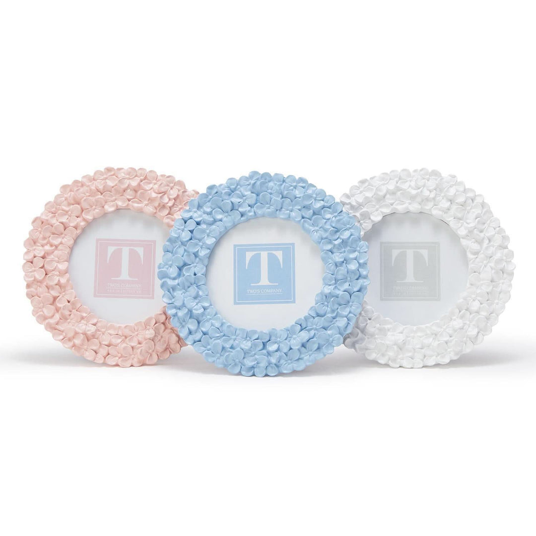 Three decorative photo frames with textured surfaces and initials on a white background