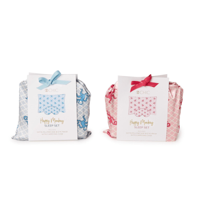 Two 'Happy Monkey' sleep sets in packaging on a white background