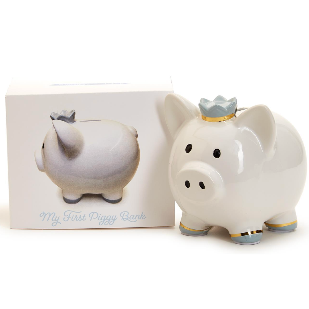 White piggy bank with a crown and packaging labeled 'My First Piggy Bank' 