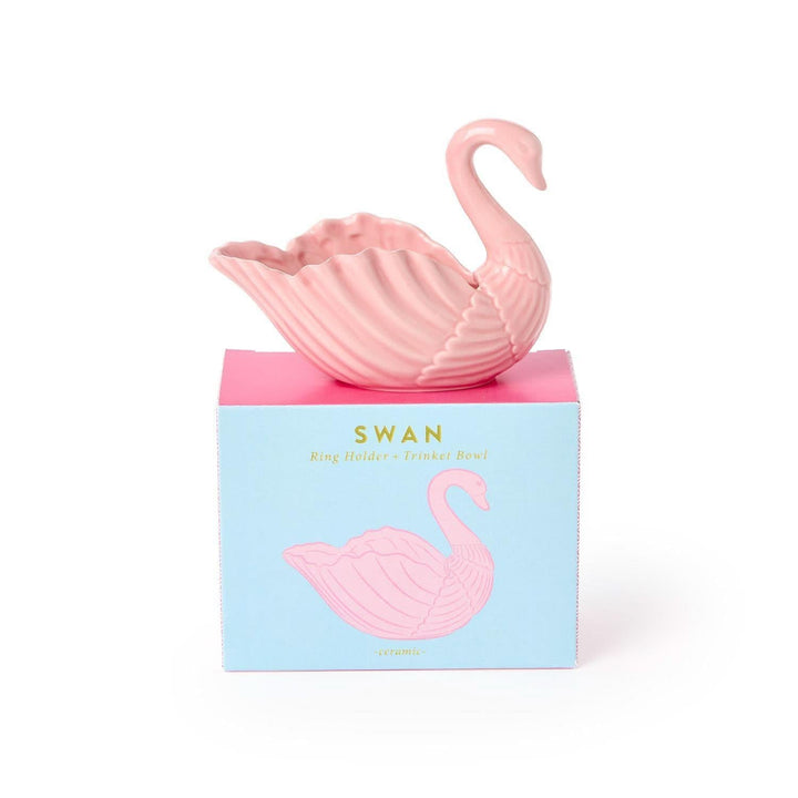 Pink swan-shaped candy bowl on a light blue box with 'Swan' text and pink swan illustration.