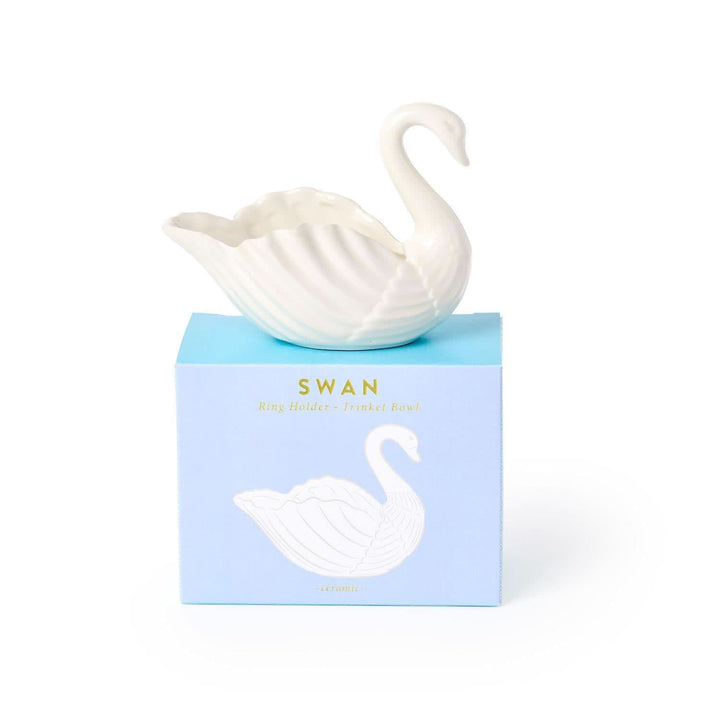 White swan-shaped object on a blue box with 'Swan' branding