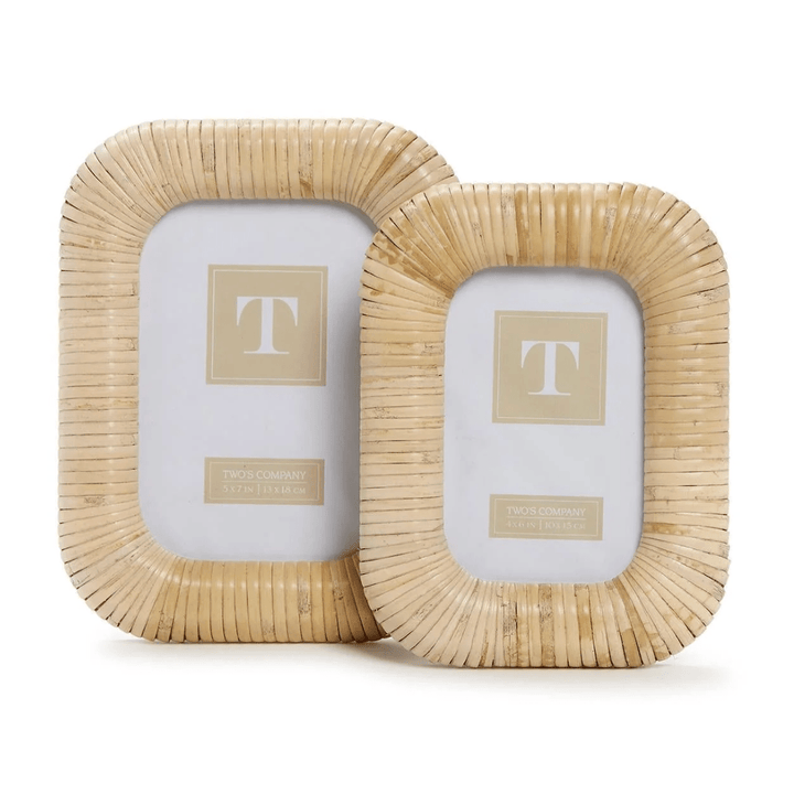 Two wicker picture frames with a visible brand logo on a white background