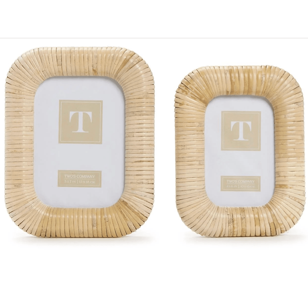 Two rectangular rattan picture frames on a white background