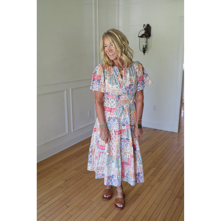 Woman wearing a colorful patterned dress 