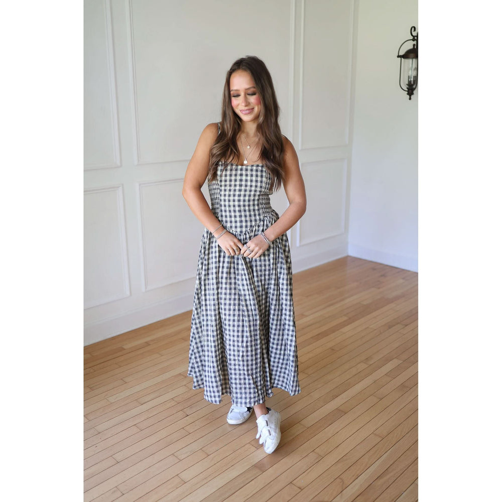 Woman wearing a checkered dress 