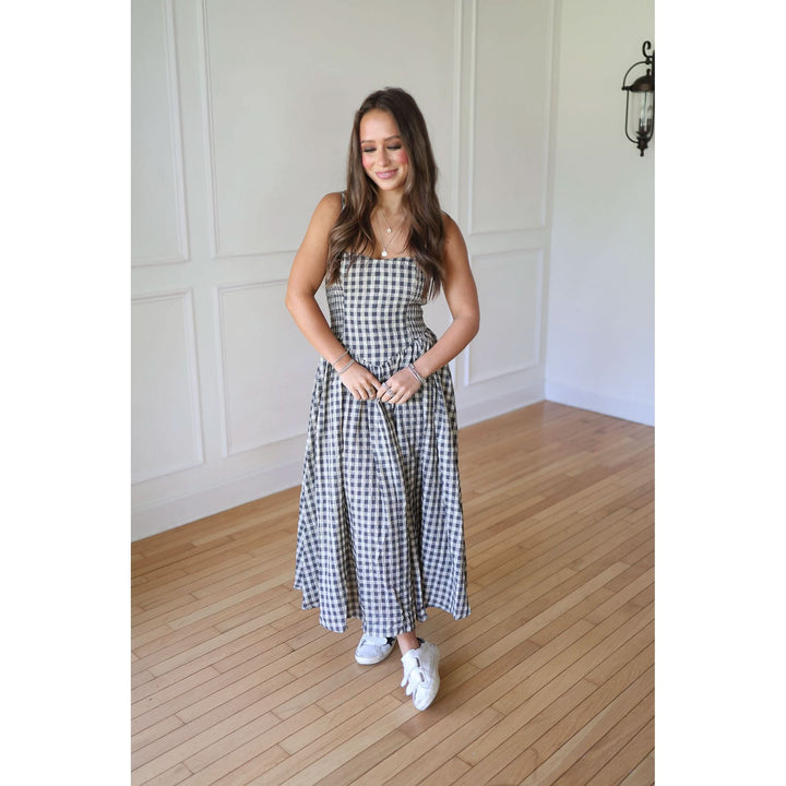 Woman wearing a checkered dress 