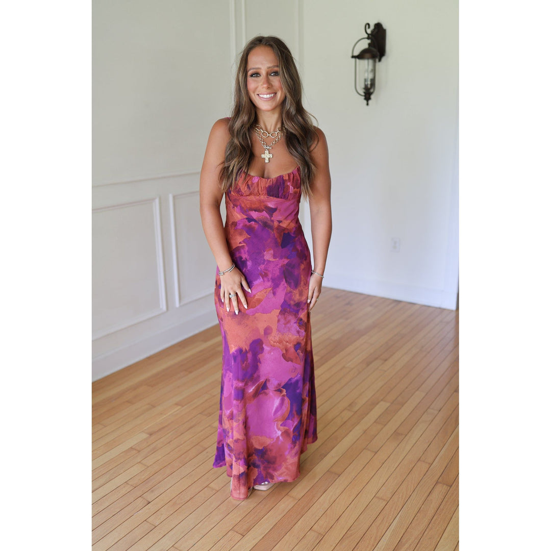 Woman wearing a colorful strapless dress 