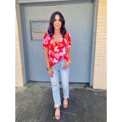 bold pink floral top